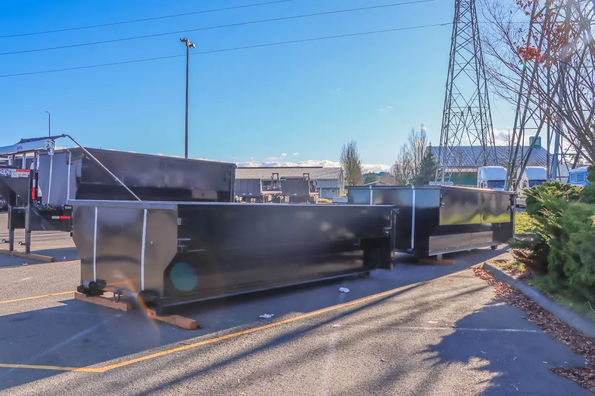Roll-off dumpster ready for waste disposal at job site for Construction Dumpster Rental in Covington